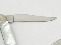 2003 Case XX Mother of Pearl 9/11 Commemorative Muskrat Pocket Knife - Hers and His Treasures