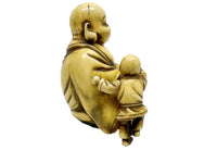 1950's Prince Hotei God Buddha and Child Celluloid Table Lighter - Hers and His Treasures