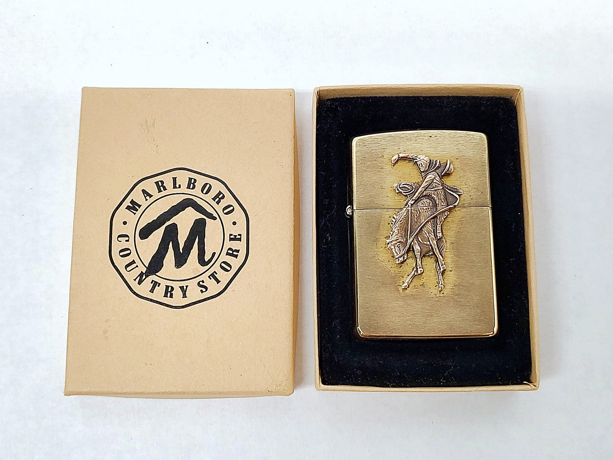 New XI 1995 Marlboro Country Store Brass Bucking Bronco Zippo Lighter - Hers and His Treasures