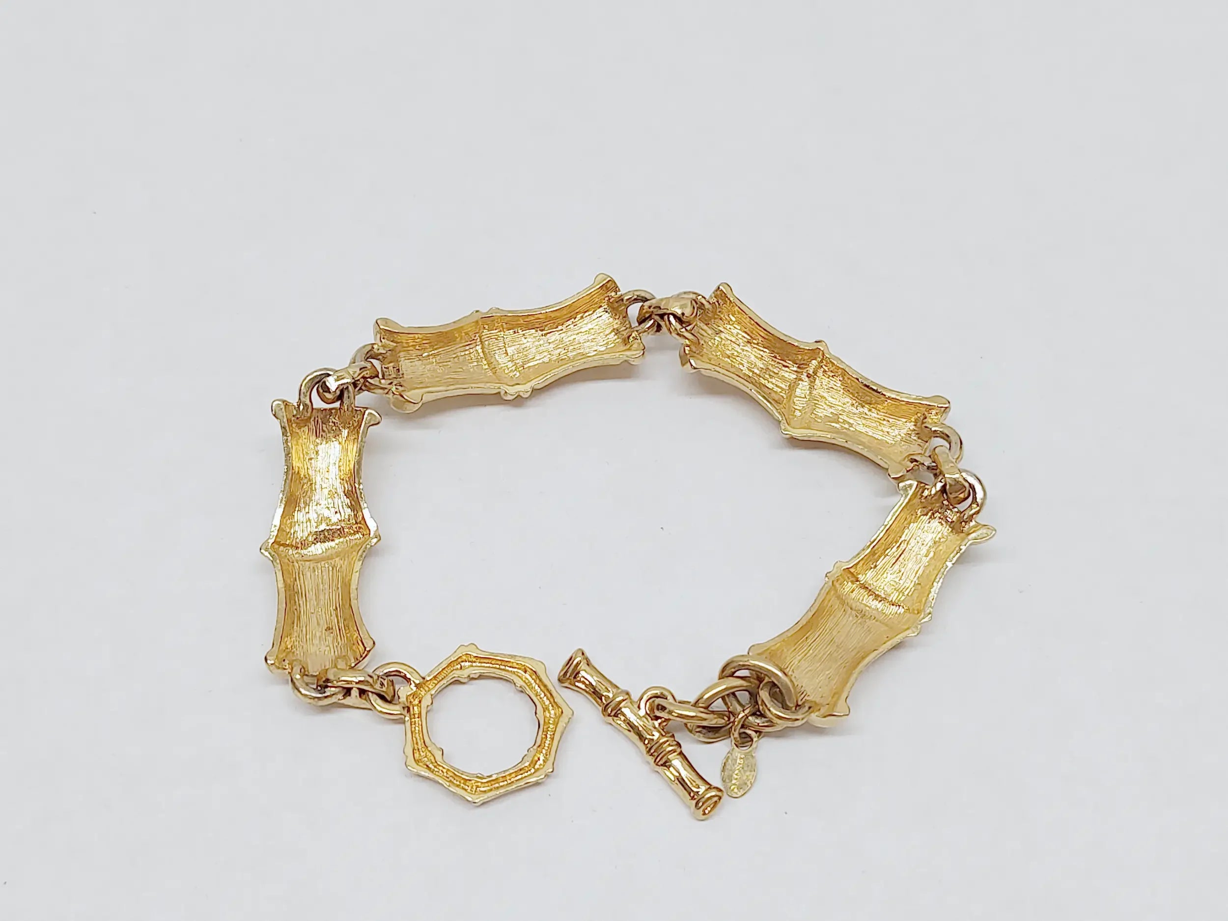 Monet Brushed Gold Tone Bamboo Link Bracelet – Hers and His Treasures