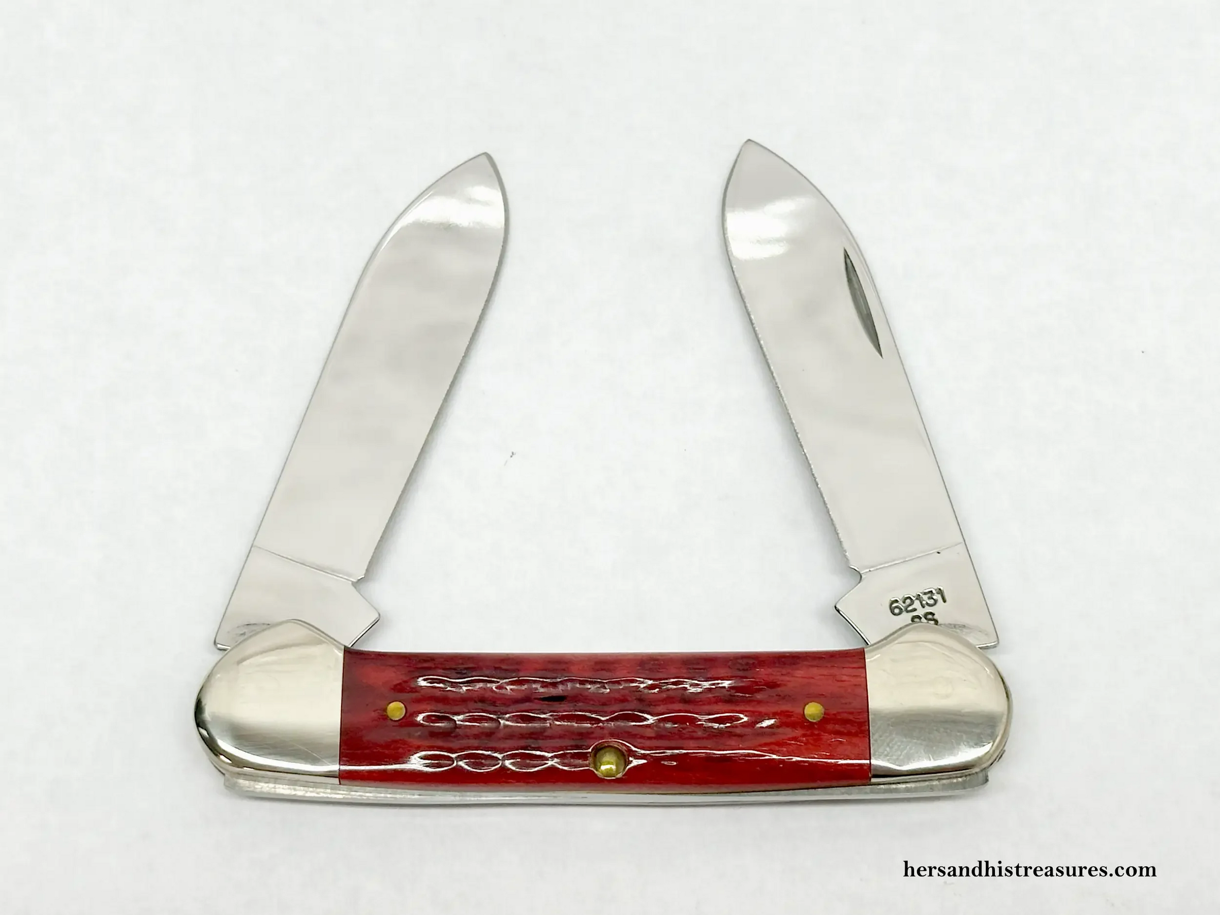 1997 Case XX Limited Edition Red Bone Pocket Worn Zippo and Canoe 1997 Case XX Limited Edition Red Bone Pocket Worn Zippo and Canoe