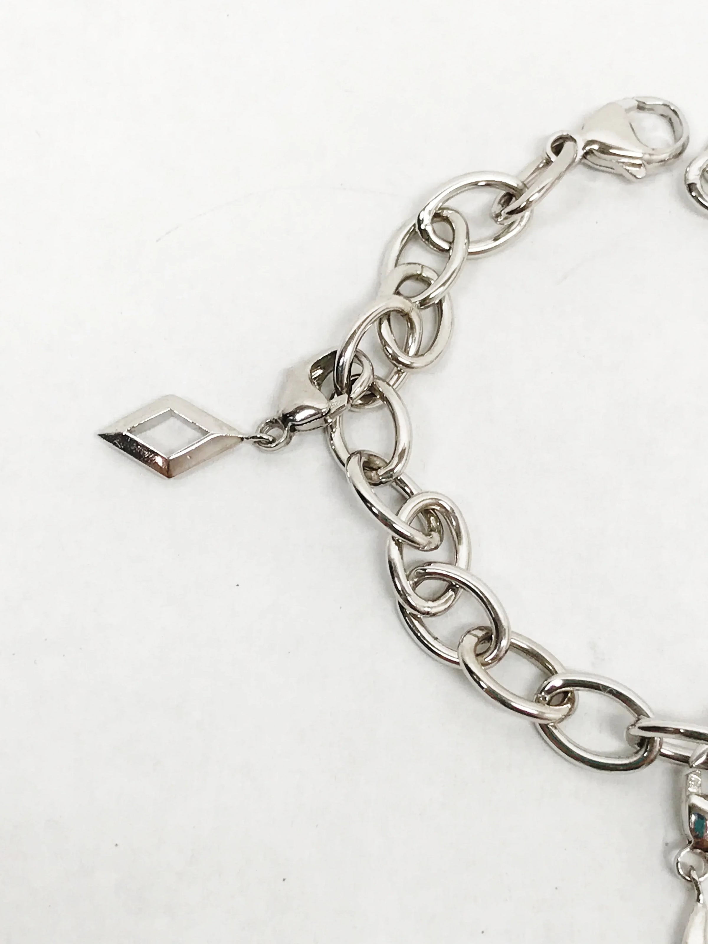 www.hersandhistreasures.com/products/925-sterling-silver-chain-link-bracelet-with-charms
