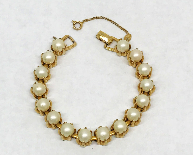 www.hersandhistreasures.com/products/1955-1963-benedikt-ny-gold-tone-bracelet-with-faux-pearls