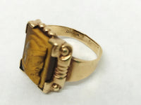 www.hersandhistreasures.com/products/antique-signet-10k-gold-ob-ostby-barton-cameo-gladiator-tigers-eye-ring-titanic-history