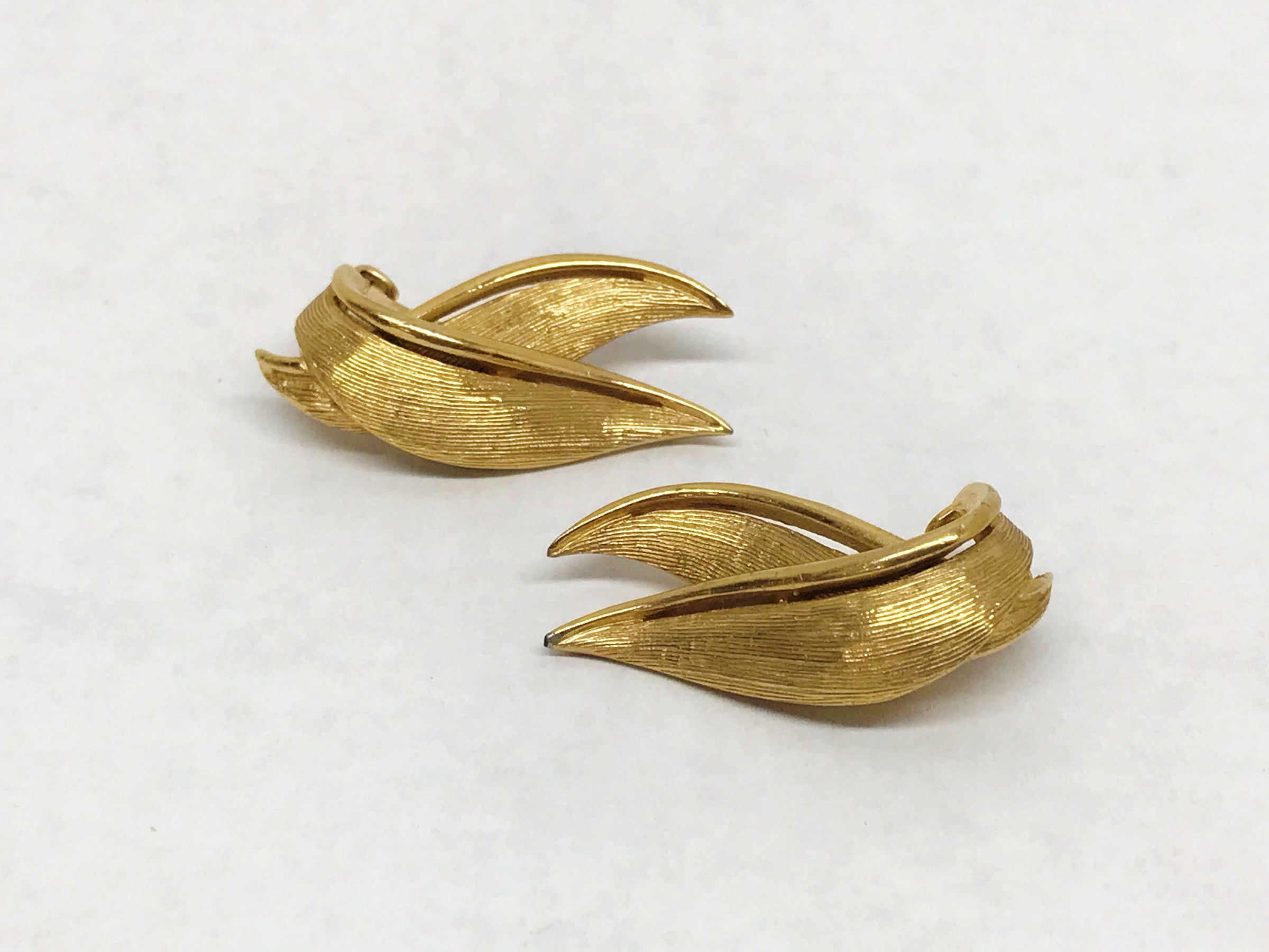 www.hersandhistreasures.com/products/1955-1971-marcel-boucher-gold-tone-clip-on-earrings