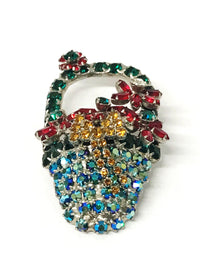 www.hersandhistreasures.com/products/dorothy-bauer-rhinestone-domed-flower-basket-brooch-pin-usa