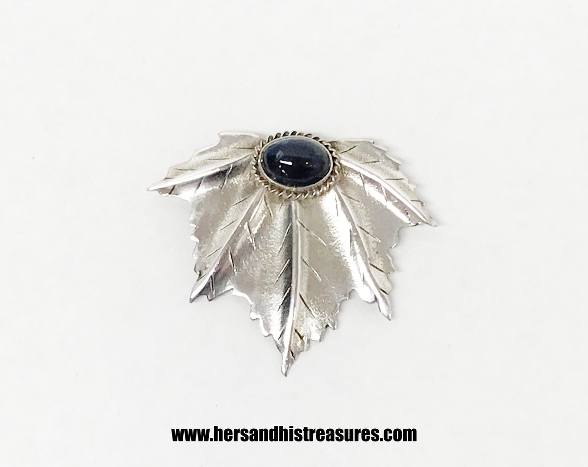 www.hersandhistreasures.com/products/925-sterling-silver-leaf-brooch-pin-with-dark-blue-agate-stone-cabochon