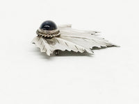 www.hersandhistreasures.com/products/925-sterling-silver-leaf-brooch-pin-with-dark-blue-agate-stone-cabochon