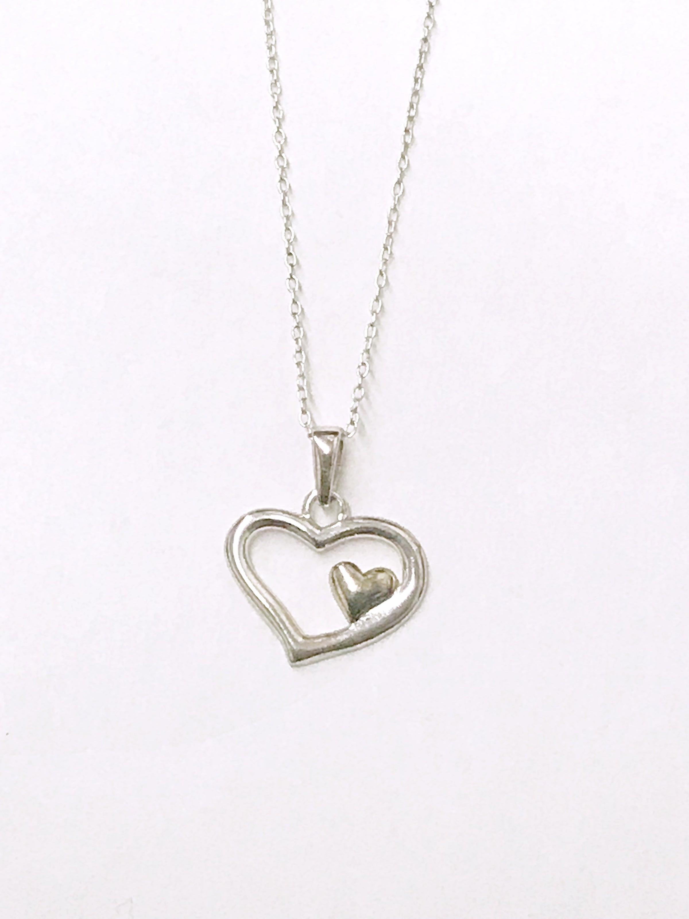 www.hersandhistreasures.com/products/heart-within-a-heart-sterling-silver-necklace