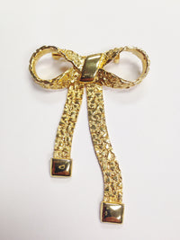 www.hersandhistreasures.com/products/1980's-Gold-Tone-Nugget-Bow-Brooch-Pin