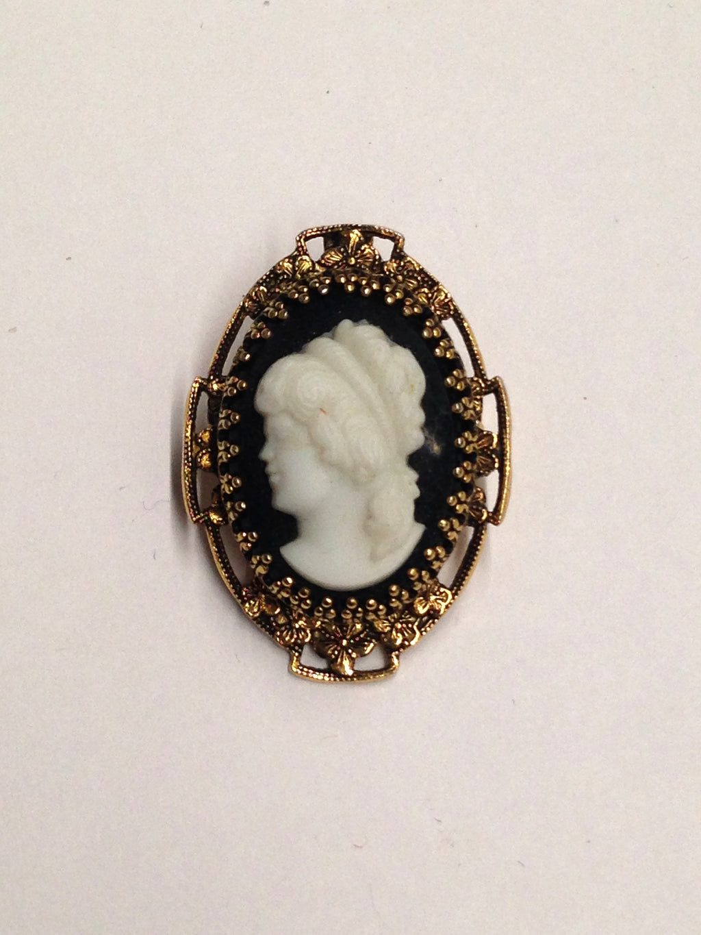 Left Facing Cameo Brooch Pin On Black Background – Hers and His Treasures