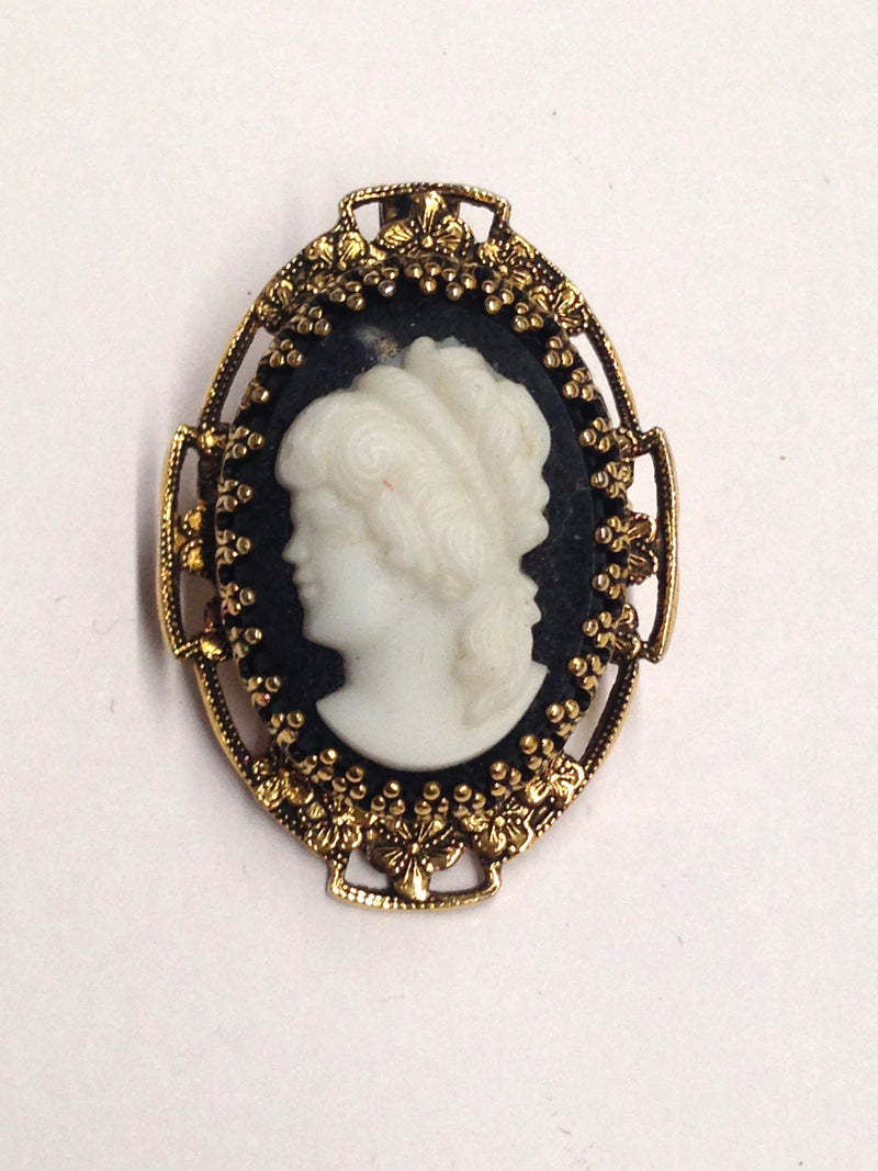 Left Facing Cameo Brooch Pin On Black Background