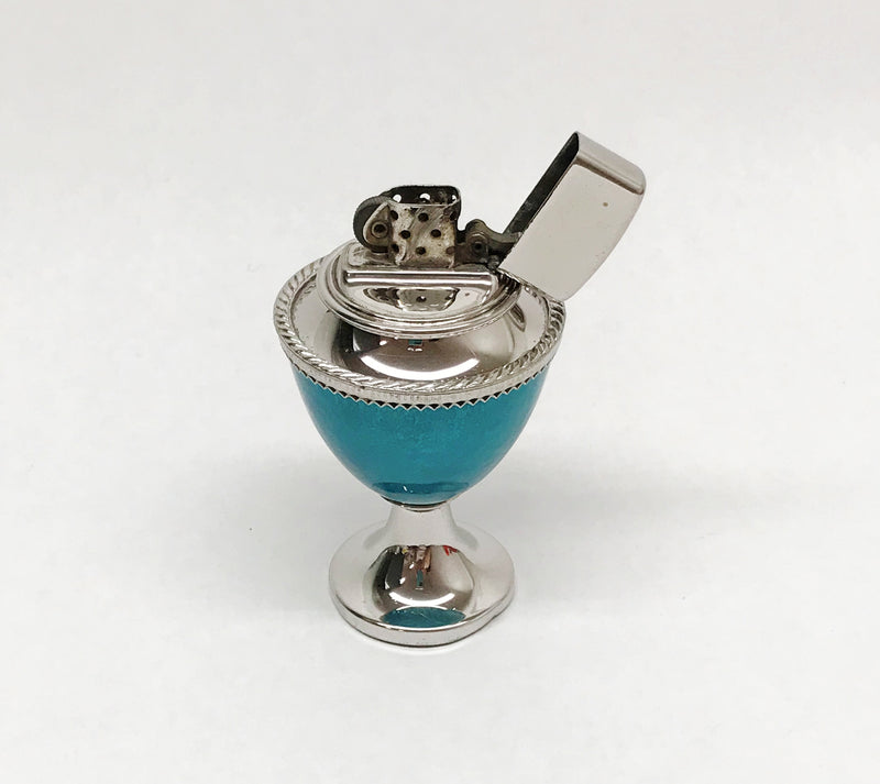 www.hersandhistreasures.com/products/1960-1966-corinthian-turquoise-and-rhodium-finish-zippo-lighter-no-1715