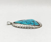 www.hersandhistreasures.com/products/c-j-nez-chester-nez-large-native-american-turquoise-sterling-silver-pendant