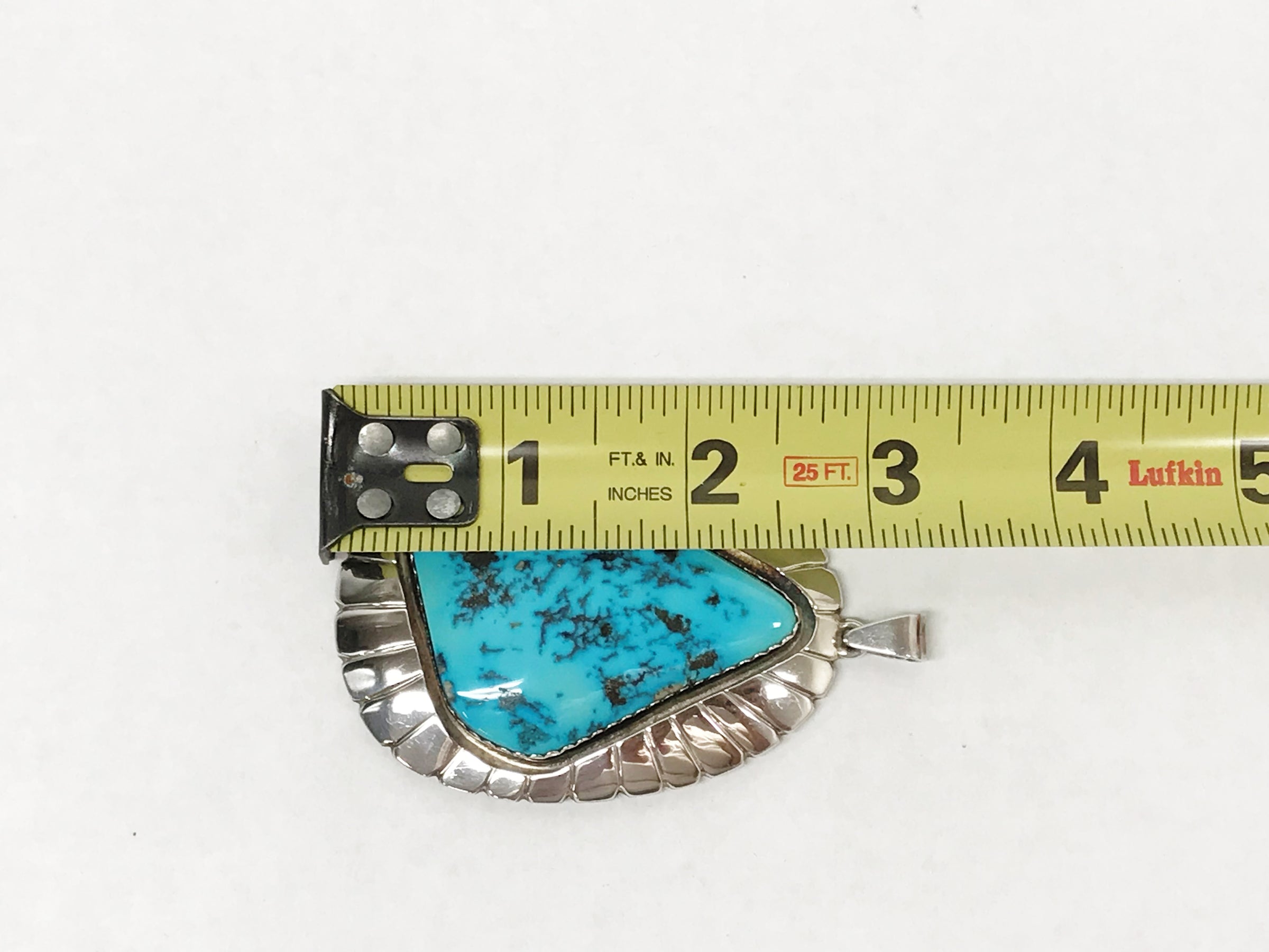 www.hersandhistreasures.com/products/c-j-nez-chester-nez-large-native-american-turquoise-sterling-silver-pendant