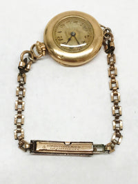 www.hersandhistreasures.com/products/1930s-hallmark-20-year-gold-filled-over-sterling-silver-ladies-wristwatch
