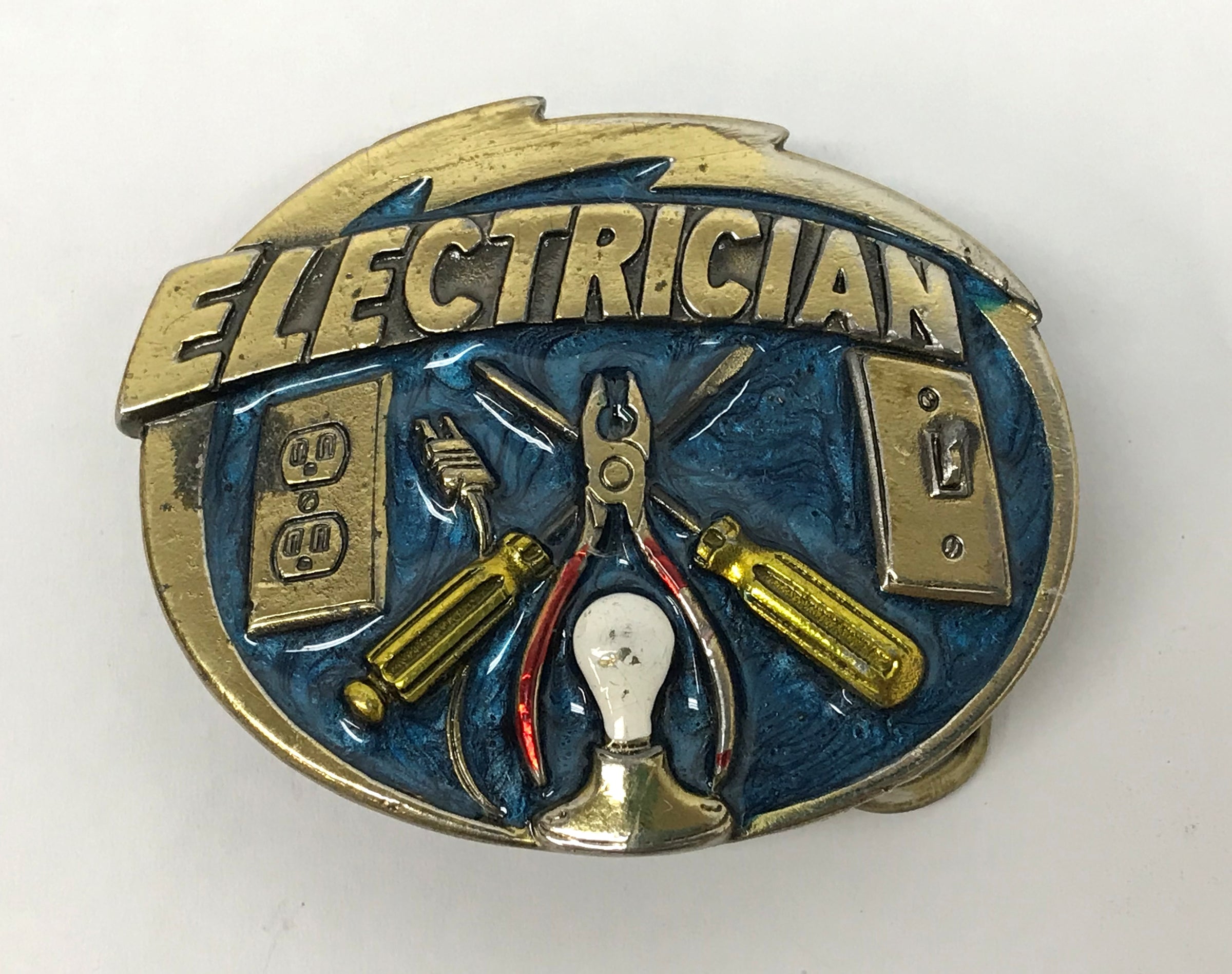 1982 Enamel and Brass Electrician Belt Buckle USA