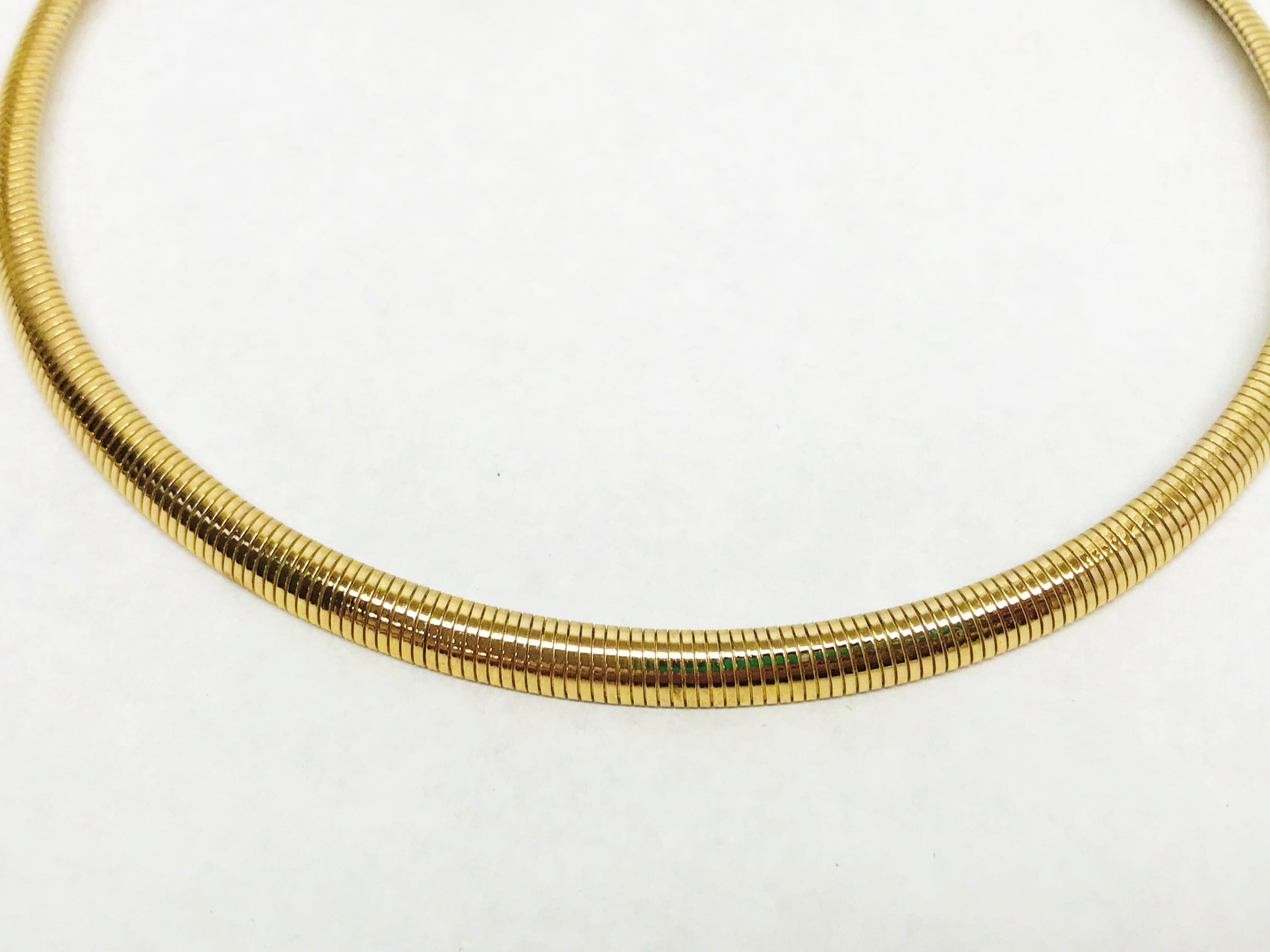 www.hersandhistreasures.com/products/gold-toned-snake-chain-coil-necklace