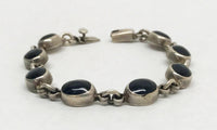 TO-90 Taxco Oval Black Onyx Link .925 Sterling Silver Bracelet - Hers and His Treasures