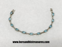 Blue Topaz Sterling Silver Infinity Bracelet