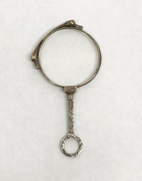 www.hersandhistreasures.com/products/1920s-s-l-sterling-silver-folding-lorgnette-glasses-or-magnifier